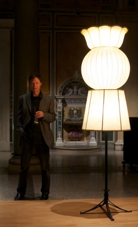 Artist Herman Fink with one of his lamps